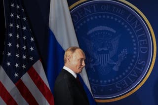 Russian president Vladimir Putin arrives for a joint press conference with the US president after participating in a US-Russia summit on Ukraine at Joint Base Elmendorf-Richardson in Anchorage